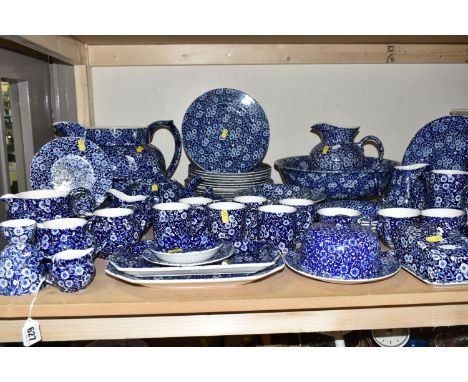 FIFTY EIGHT PIECES OF BLUE AND WHITE BURLEIGH 'CALICO' PATTERN DINNERWARE, comprising a water pitcher and wash bowl, two larg