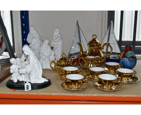 A GROUP OF CERAMICS AND TWO BOAT MODELS, comprising three Lenox matt white figure groups: 'Jesus the Carpenter', 'A Child's C