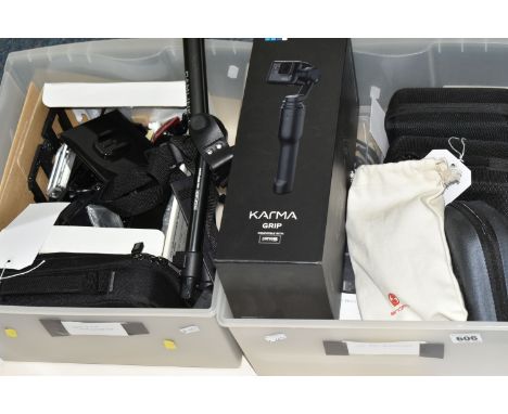 TWO BOXES OF GO PRO ACCESSORIES, to include a cased Hero 3+ camera, a cased Hero 4 camera, a Hero camera, a boxed Karma Grip,