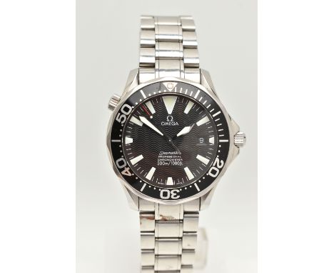 AN OMEGA SEAMASTER WRISTWATCH, the circular black dial, with illuminous hourly applied markers, white metal illuminous infill
