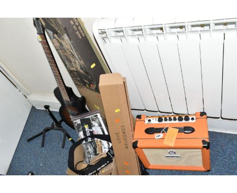 AN EPIPHONE ELECTRIC GUITAR AND AMP, a boxed  Epiphone Les Paul Special - Vintage Edition electric guitar made in China unuse