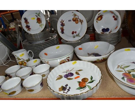 A FIFTY-TWO PIECE ROYAL WORCESTER EVESHAM DINNER SERVICE comprising a quiche dish, a fruit bowl, a serving bowl, a sauce jug,