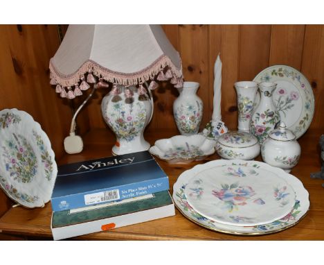 A GROUP OF AYNSLEY 'WILD TUDOR' PATTERN GIFTWARE, comprising a candlestick decorated with applied flowers, two vases, a table