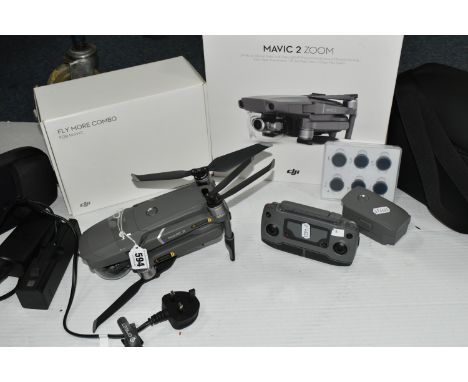 ONE BOX CONTAINING A DJI MAVIC 2 ZOOM DRONE AND ACCESSORIES, comprising a boxed Mavic 2 Pro drone with a boxed 'Fly More Comb