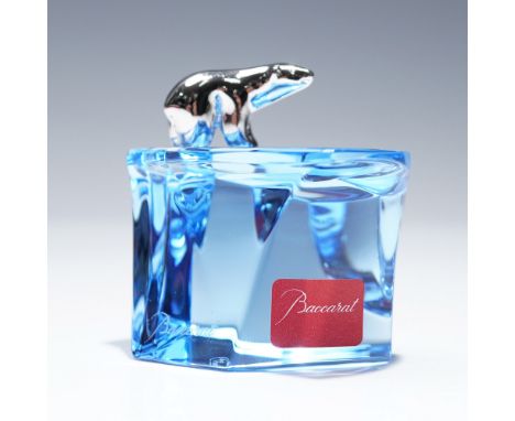 Striking and modern, this Baccarat crystal figurine features a sculptural iceberg base in luminous blue crystal, seamlessly t