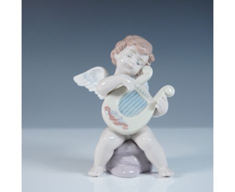 Lladro Adagio, model 01006628, also known as Adagio Angelical, is a beautifully sculpted porcelain figurine featuring a cheru