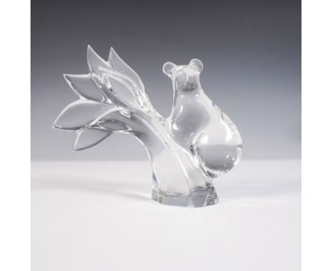 A stunning Baccarat crystal figurine depicting a koala perched on a stylized tree branch, designed by renowned artist Robert 