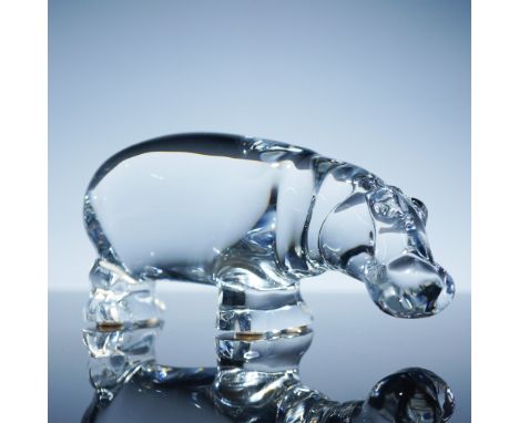 Clear crystal hippopotamus figurine by Baccarat, featuring smooth contours and minimalist detail in a compact form. This char