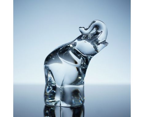 A captivating Steuben crystal elephant figurine, exemplifying the renowned craftsmanship of Steuben Glass Works. Designed in 