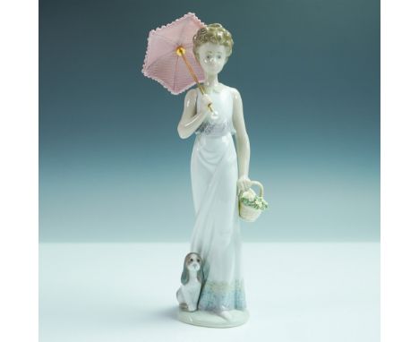 Graceful Lladro porcelain figurine titled Garden Classic, model number 1007617. Sculpted by Juan Huerta and issued as a 1991 