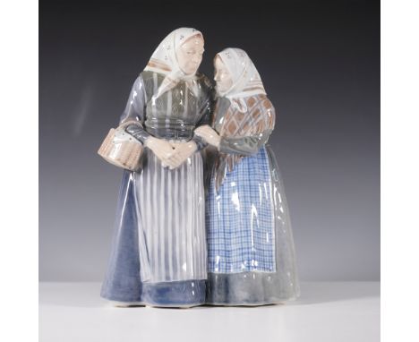 A charming Royal Copenhagen porcelain figurine depicting two elderly women engaged in quiet conversation. Dressed in traditio