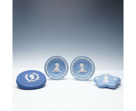 A collection of Wedgwood blue Jasperware commemorative pieces celebrating British royalty. This lot includes a 1953 Wedgwood 