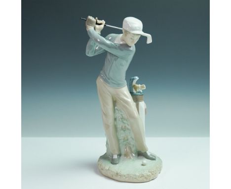 Dynamic Lladro porcelain figurine titled Golfer, model number 1004824. Sculpted by Vincente Martinez and first issued in 1972