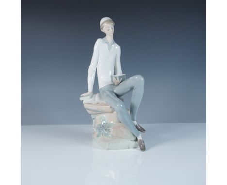 A finely crafted Lladro porcelain figurine titled Hebrew Student, model number 1004684. This elegant piece depicts a young sc