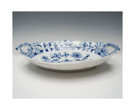 This Meissen porcelain serving bowl showcases the iconic Blue Onion pattern, featuring intricate cobalt blue floral and folia