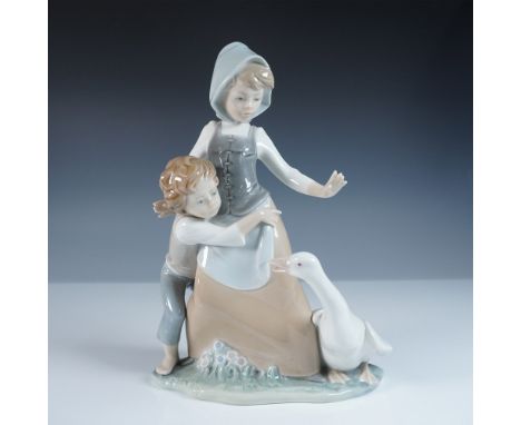 This Lladro figurine, titled Avoiding the Goose (#1005033), captures a charming rural scene of a young girl and boy startled 