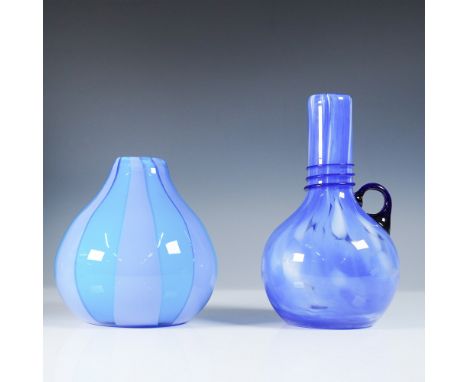 A striking duo of handblown art glass vases in captivating shades of blue. The first vase features a Czech art glass design w