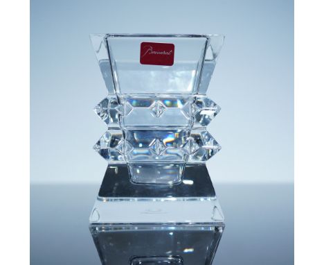 This exquisite Baccarat Colombine vase showcases a striking geometric design with faceted crystal details that reflect light 