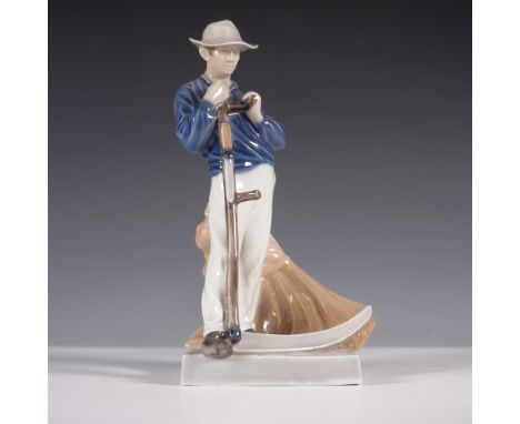 A finely detailed Royal Copenhagen porcelain figurine depicting a farmer leaning on his scythe, taking a momentary rest from 