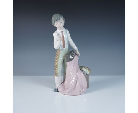 This Lladro figurine, titled Reverent Matador (#1005115), portrays a young matador in an elegant pose, paying respect before 