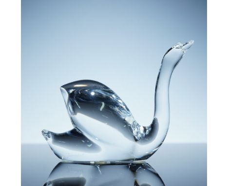Elegant Baccarat crystal swan figurine, masterfully crafted in France. This stunning piece captures the grace of a swan in a 