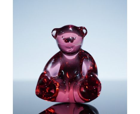 Baccarat crystal spinning bear figurine in pink. This whimsical piece features Baccarat’s signature smooth, modern design wit