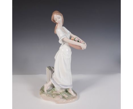 Ethereal and graceful, this Lladro porcelain figurine titled Gardens of Athens, model number 1007704, was sculpted by Joan Co