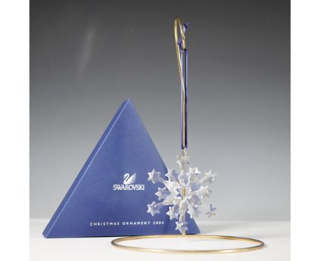 Presenting the Swarovski 2004 Annual Christmas Ornament, a retired limited edition piece that exemplifies the brand's renowne