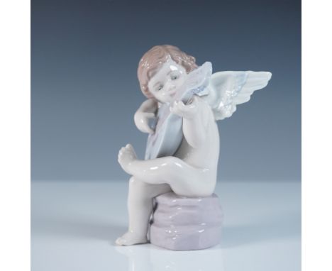 Lladro Allegro, model 01006629, also known as Allegro Angelical, is a beautifully sculpted porcelain figurine featuring a che