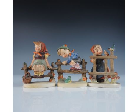 This 3-piece Goebel Hummel figurine set includes Just Resting (#112/1), Retreat to Safety (#201/0), and Signs of Spring (#203
