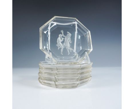 Refined and visually captivating, this 5-piece crystal dessert plate set showcases an exquisite intaglio-etched design of cla