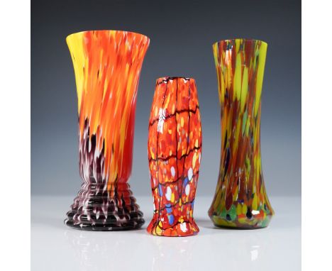 A striking set of three Czech art glass vases, each showcasing a vibrant splatter design with a mesmerizing interplay of colo