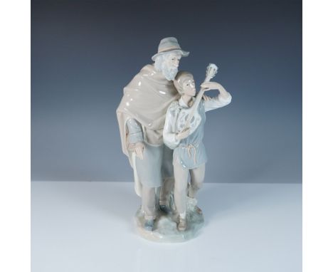 Lladro porcelain figurine Happy Travelers (1004652) portrays an elderly musician and a young boy in medieval-style attire, ev
