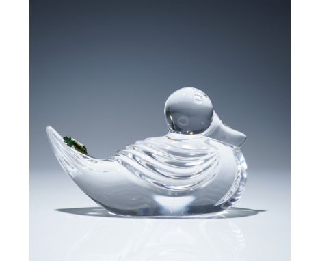 Waterford Crystal clear crystal paperweight in the form of a duck. Features a stylized representation of a duck with smooth b