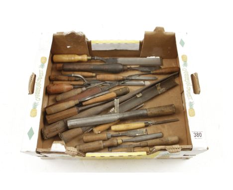 Two heavy gouges, a bruzz and 20 other chisels, gouges and carving tools G+ 