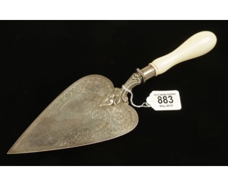 A silver plated presentation trowel engraved Presented to Miss Kath Riley on the Occasion of Laying a Foundation Stone of Can