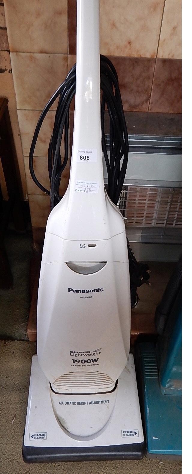 A Panasonic Super Lightweight 1900W upright vacuum cleaner.