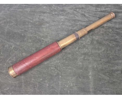 A J H Steward leather bound four draw telescope with a 4cms obejective