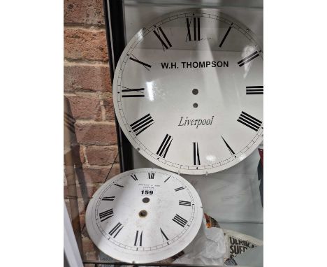 Two circular clock dials, the smaller enamel dial inscribed for French &amp; Son, London, the larger painted dial for W H Tho