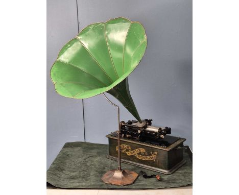 An Edison Home Phonograph to play cylinder discs and within a green stained wooden case