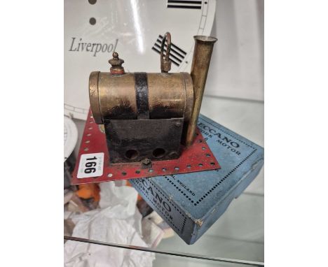 A boxed Meccano clockwork motor together with a 'Hobbies' live steam stationary engine