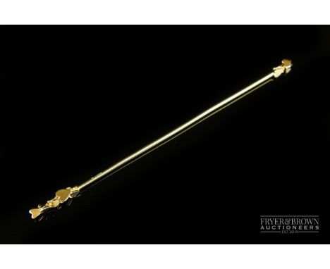 A most unusual Lovers 18 carat gold Champagne swivel stick , designed by John Siddely , the yellow gold stick applied to the 