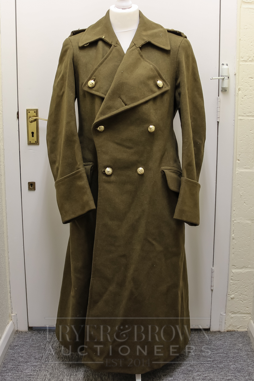 A World War II British Army General's greatcoat, crossed sword & baton ...