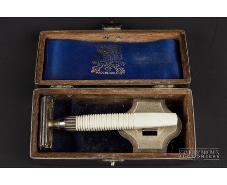 A Wilkinson Sword razor, in original box