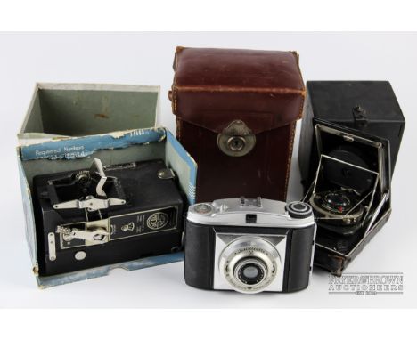 A Baldixette Balda-Bunde camera; a Kollenberg Essen-Compur (Rollex-Patent) Midas camera-projector; and other items