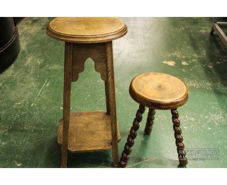 A small oak plant stand, round top, sitting on four square legs with lower shelf; with a small oak stool, round top and barle