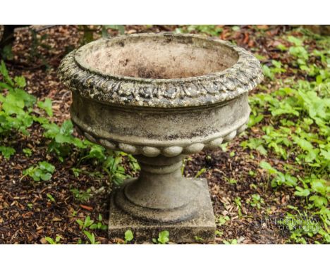 A reconstituted stone garden planter