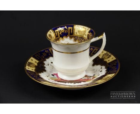 An English porcelain Dr Syntax cup and saucer, printed and painted in polychrome colours with the Doctor seated in a chair sm