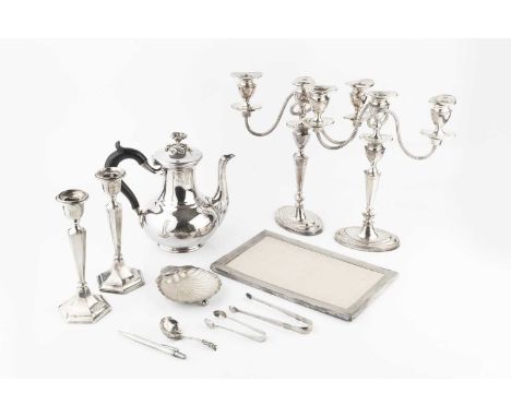 A pair of George V silver candlesticks, of tapered hexagonal form on weighted bases, Chester 1921, 20.5cm high, a silver rect
