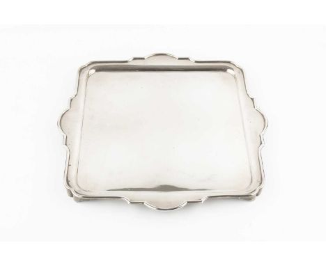 A George V silver square section salver, with shaped border, by Z. Barraclough &amp; Sons, Sheffield 1923, 37cm wide, 38.5oz